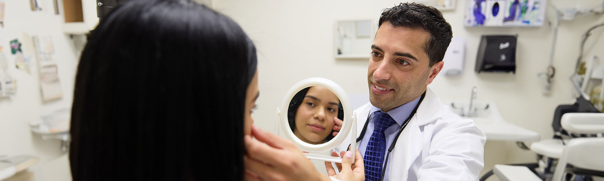 eye doctor examining patient